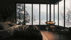 Cozy bedroom with fireplace. Snow outside the window. Cozy apartment in a winter hotel. 