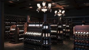 Wine shop interior. Wine bottles on wooden shelves