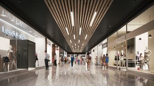 Walking people in the shopping mall center