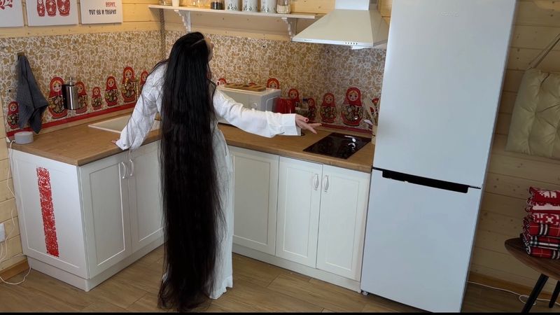 Rapunzel dancing in the kitchen with loose waves in her hair. 10 minutes 