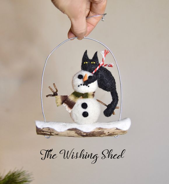 Naughty Kitty On Snowman