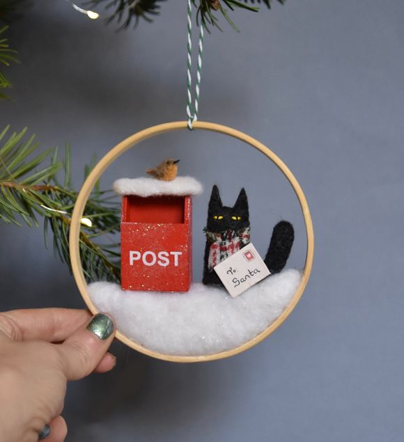 Naughty Cat posting his letter to Santa - with Robin friend 