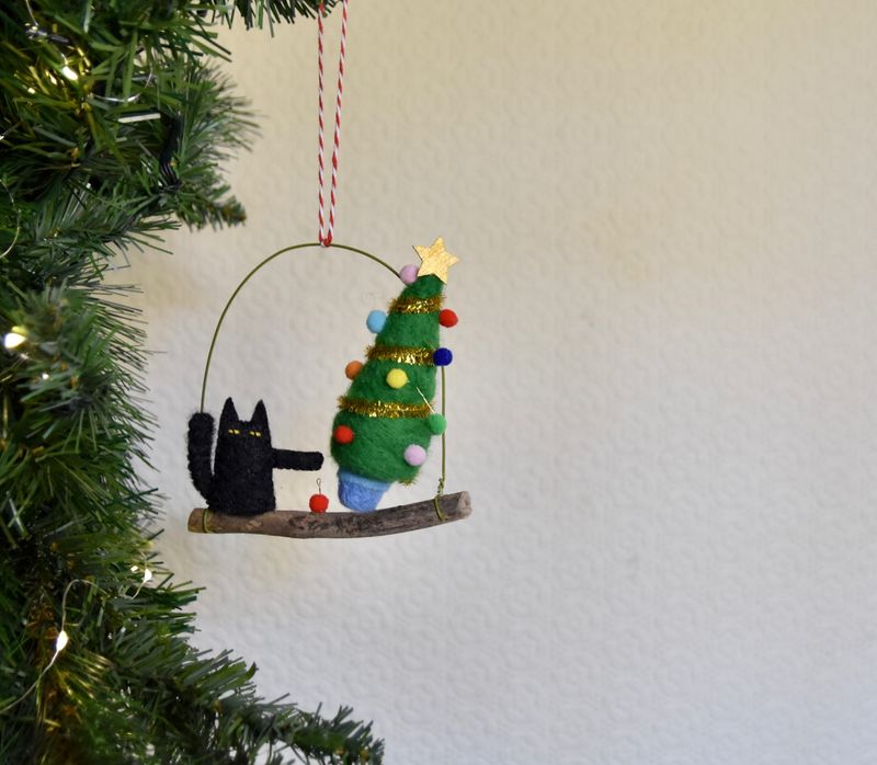 Naughty Cat Pushing over Christmas tree 