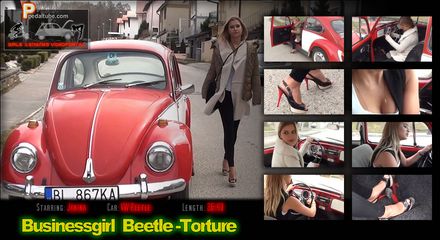 Businessgirl with a Beetle