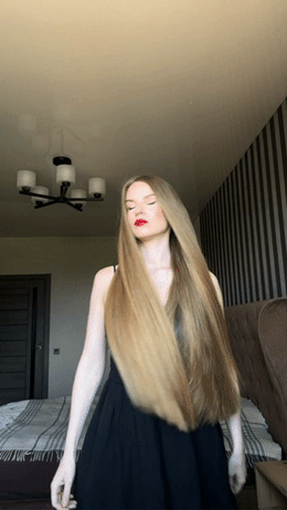 Valerie Brushing Shiny Blonde Hair