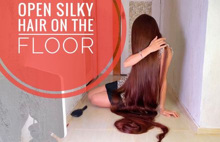 Open silky hair on the floor