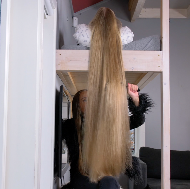 VIDEO - Celina playing with super long blonde hair