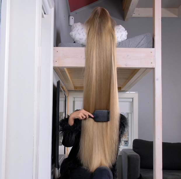 VIDEO - Celina playing with super long blonde hair