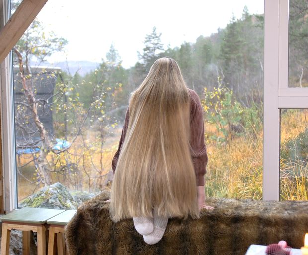 VIDEO - Massive, healthy blonde hair display by the window