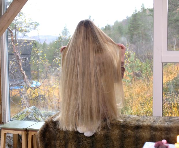 VIDEO - Massive, healthy blonde hair display by the window