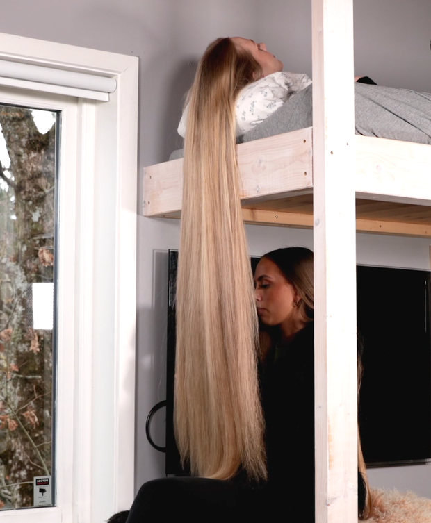 VIDEO - Celina playing with super long blonde hair