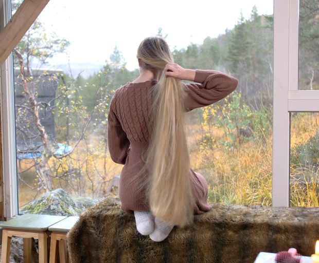 VIDEO - Massive, healthy blonde hair display by the window