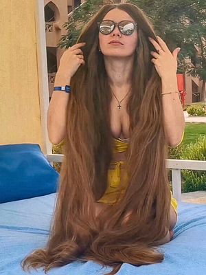 VIDEO - Blonde floor length hair play by the beach (part 1)