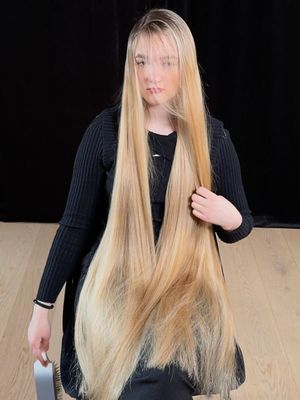 VIDEO - Very long blonde hair brushing and posing