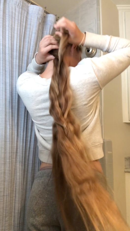 PHONE VIDEO - Serafina brushing out a braid