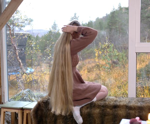 VIDEO - Massive, healthy blonde hair display by the window