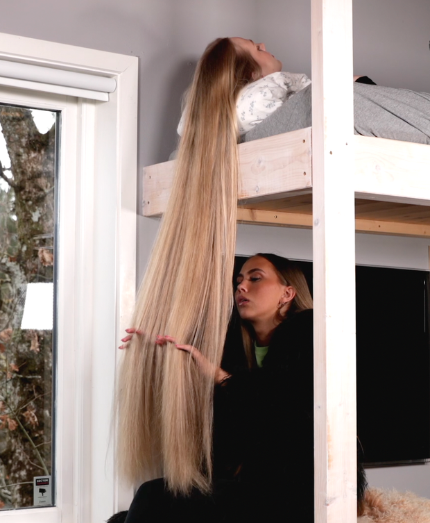 VIDEO - Celina playing with super long blonde hair