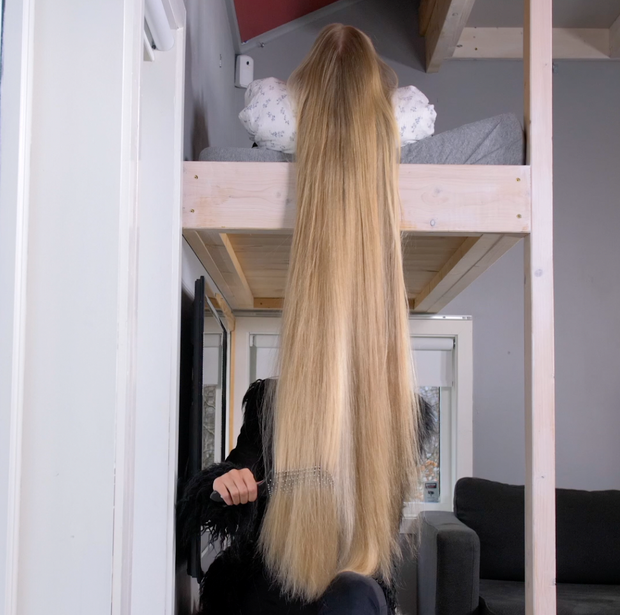 VIDEO - Celina playing with super long blonde hair