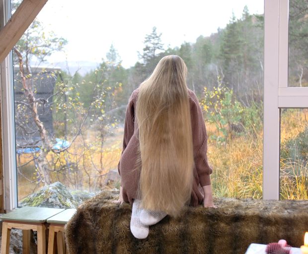 VIDEO - Massive, healthy blonde hair display by the window