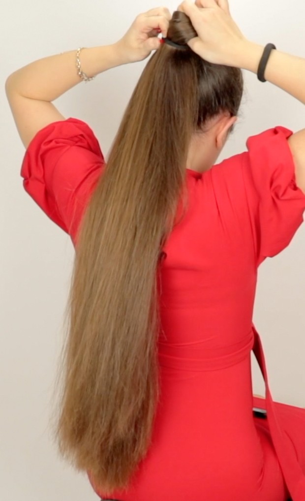 VIDEO - Tight, high ponytail