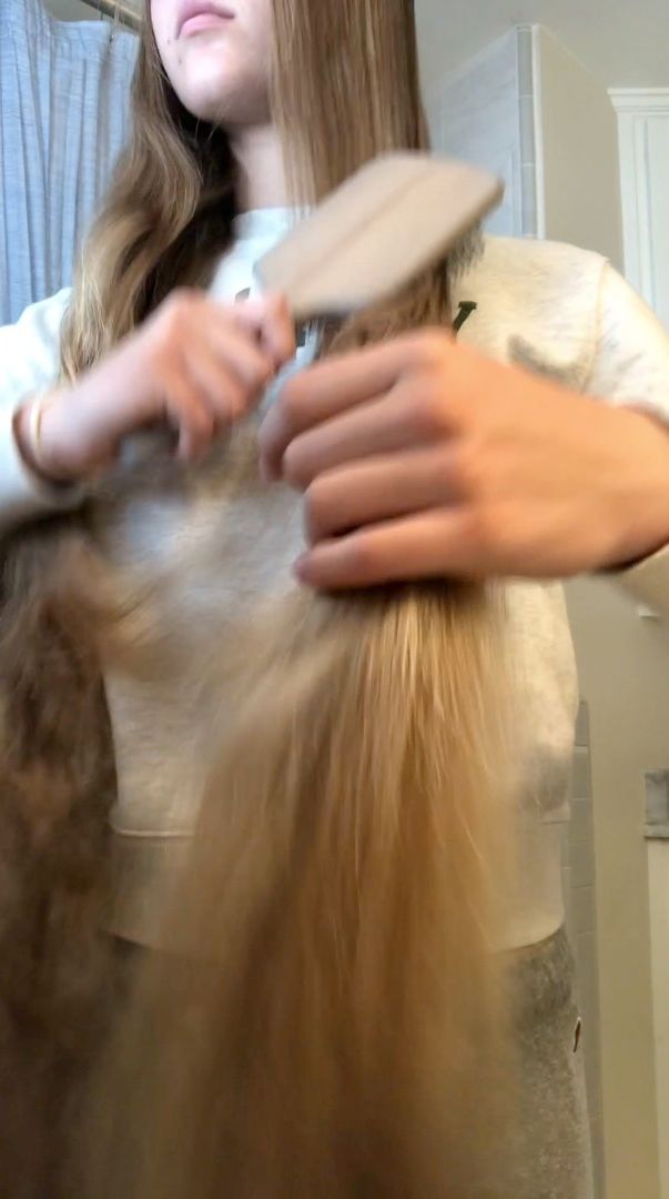 PHONE VIDEO - Serafina brushing out a braid