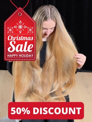 VIDEO - Really long blonde hair brushing in her lap