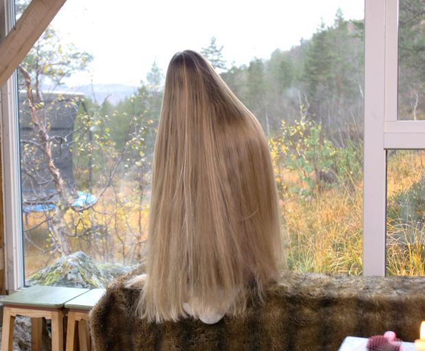VIDEO - Massive, healthy blonde hair display by the window
