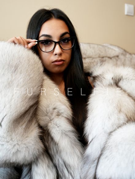 Gigi wears glasses and blue fox fur coat (167)