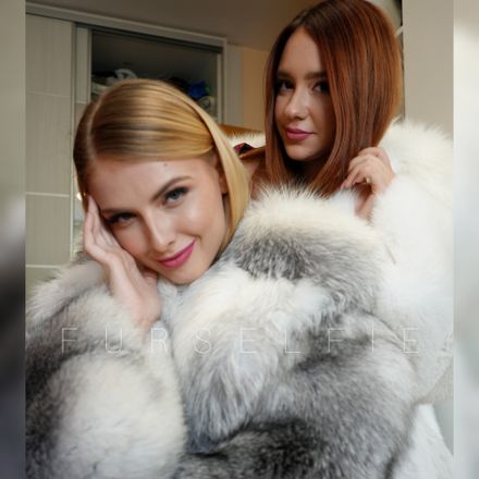 Two beauties in luxurious fox fur, radiating elegance and soft glamour.