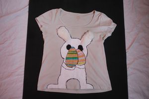Hand-painted T-shirt with an Easter bunny with fluffy ears