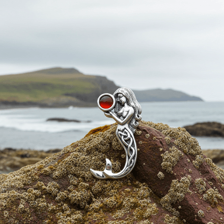 Celtic Mermaid holding a Garnet Under the Sea Pendant