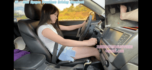 97 - Miss Nguyen Practices Driving Barefoot