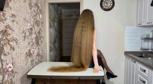 Long golden hair on the table 16 min
