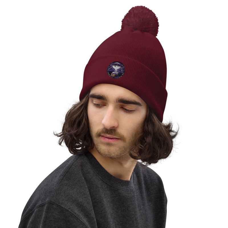 Unisex Global Disclosure Pom-Pom Beanie 