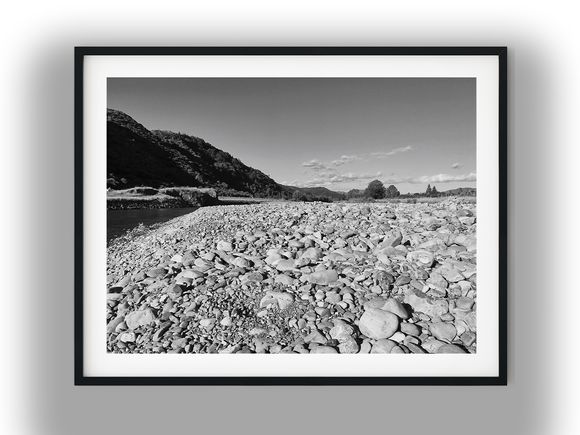 Rocky Riverbed with Forested Hillside View Black And White Photo Digital Download