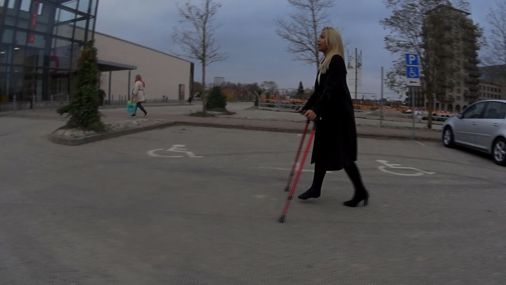 Elina 79 LLC - Straight LLC and a black boot with heel in the shopping center - 11 min