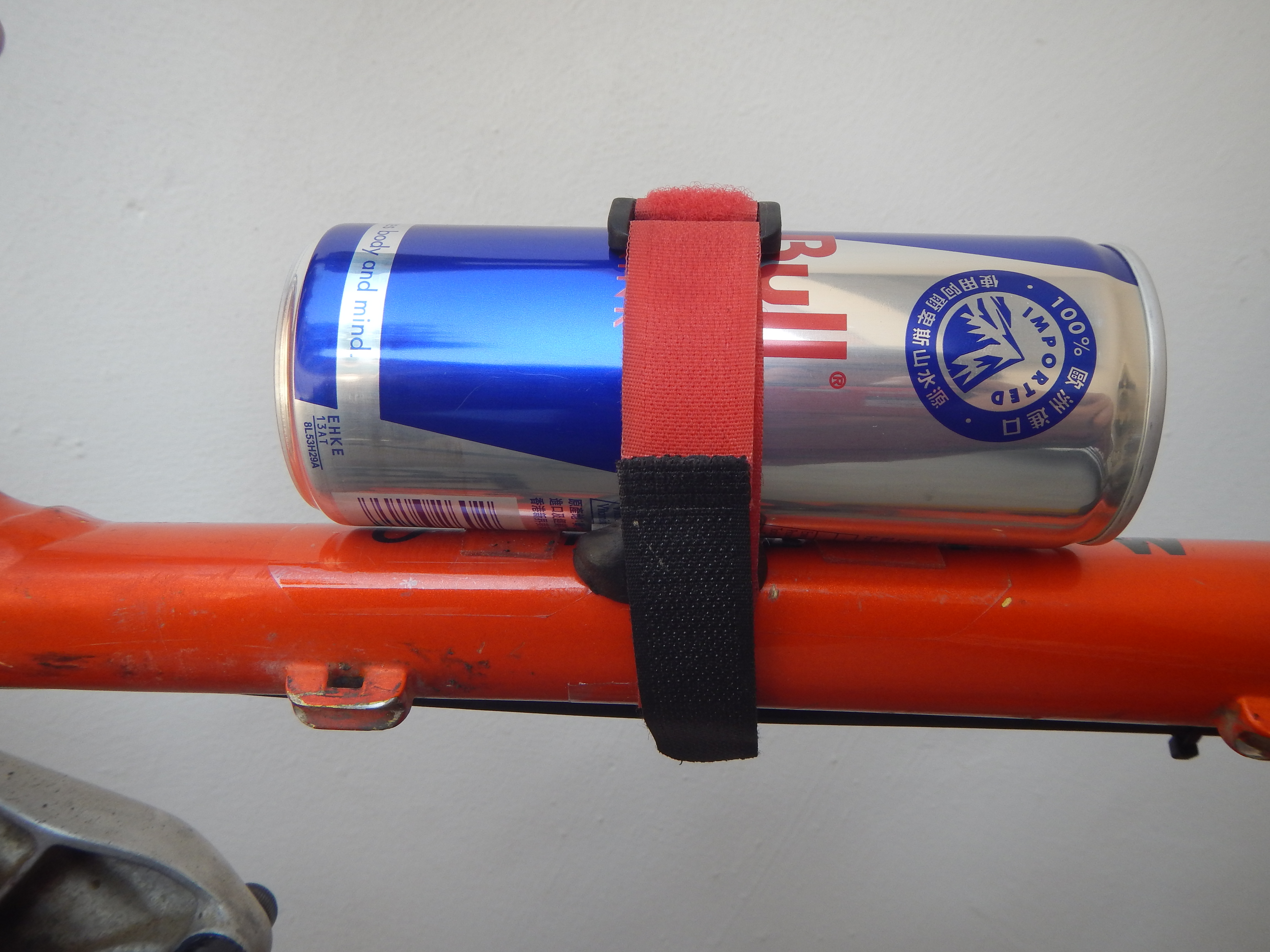 carry a mini can by bike - red bull